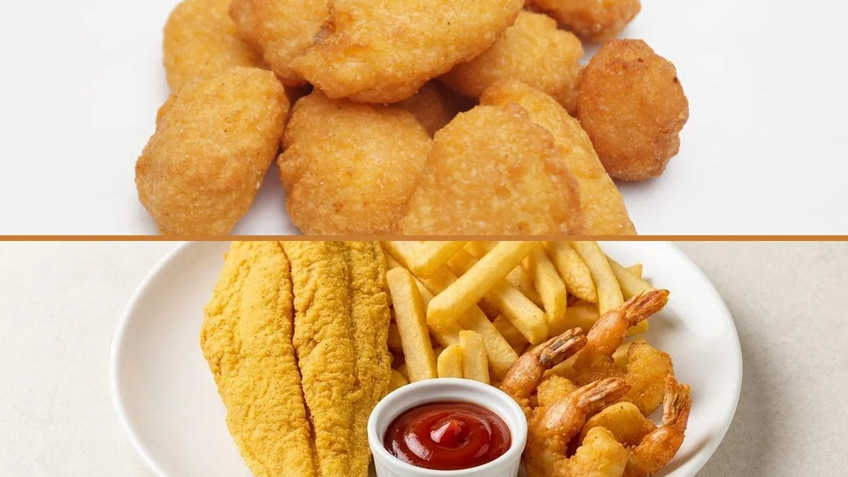 Chicken, fish, and sides ready for serving.
