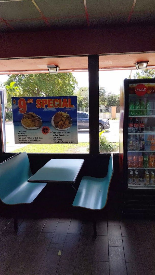 A casual restaurant counter with hot food containers.