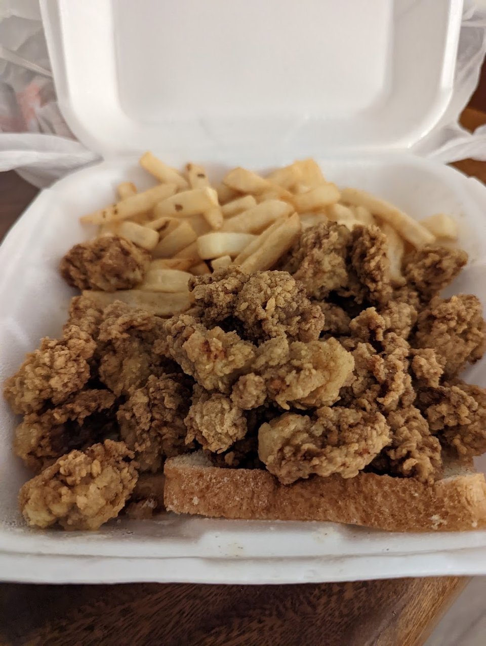 Restaurant menu with seafood and chicken selections.
